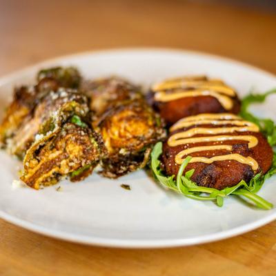 Salmon Croquettes, with crispy brussels sprouts.