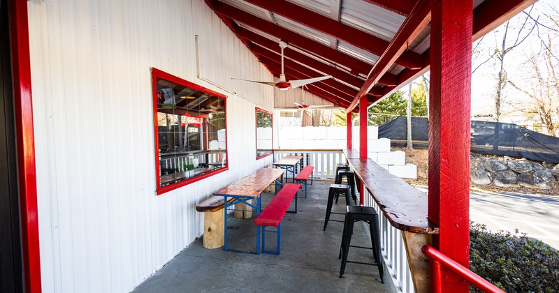 Exterior, porch terrace, bar stools and benches
