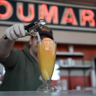 making an orangeade float.