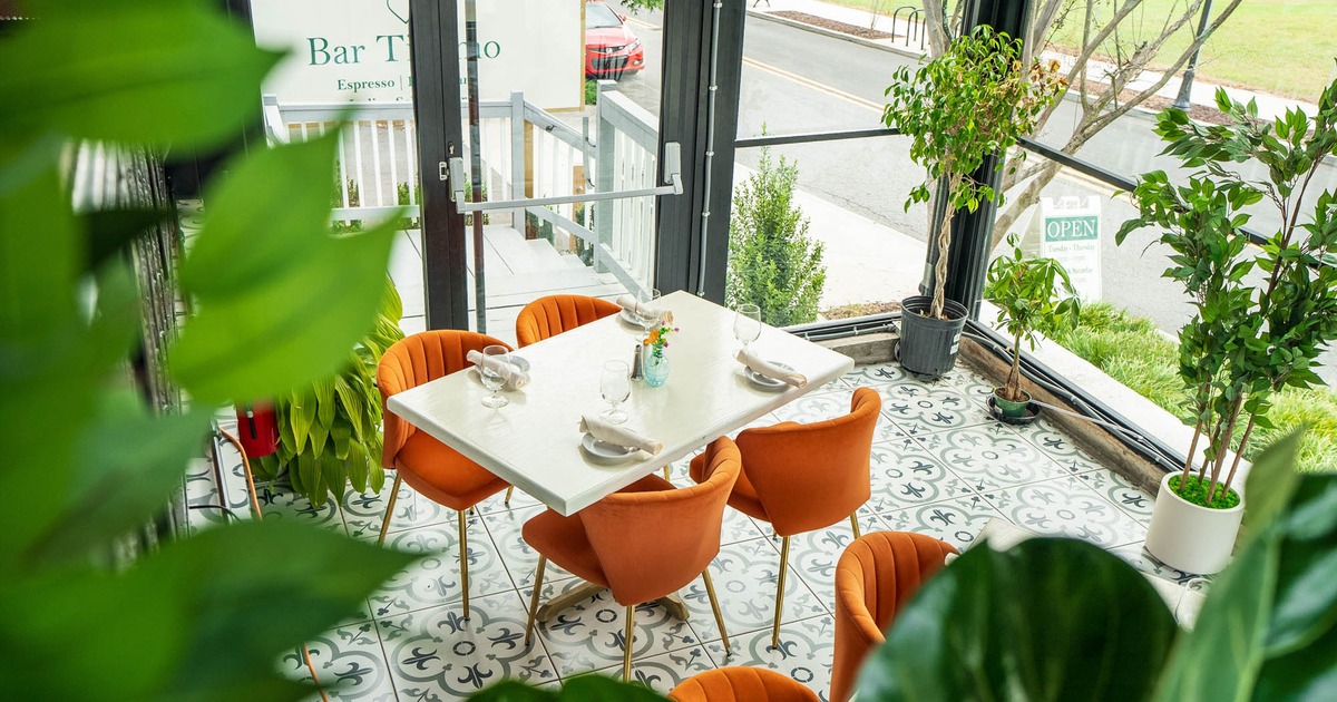 Inside, seating area with table and chairs