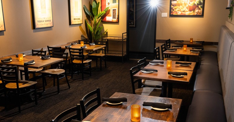 Interior, dining area with tables set for guests