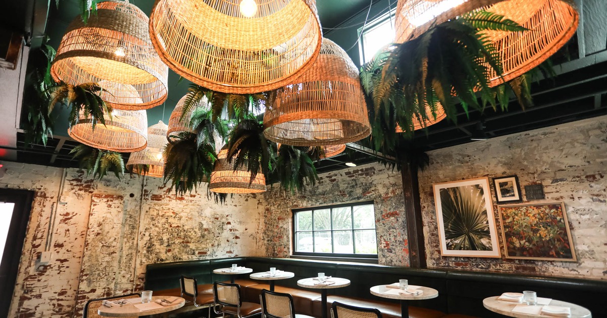 Green room, dining area, ceiling light and greenery