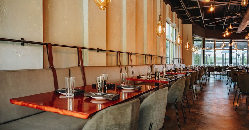 Interior, banquette seating area, tables and chairs
