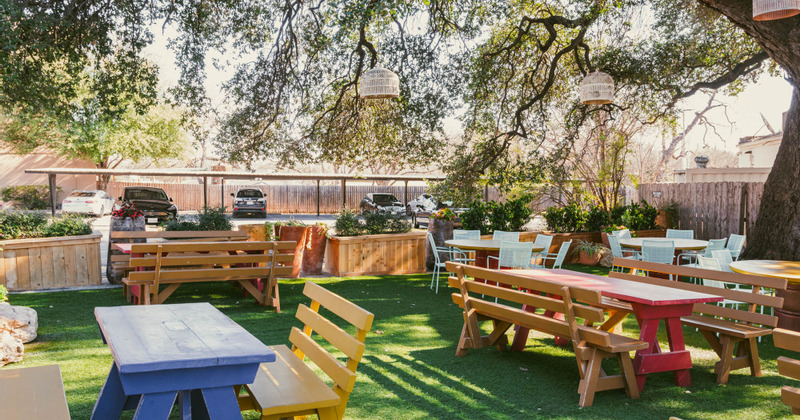 Patio tables ready for guests