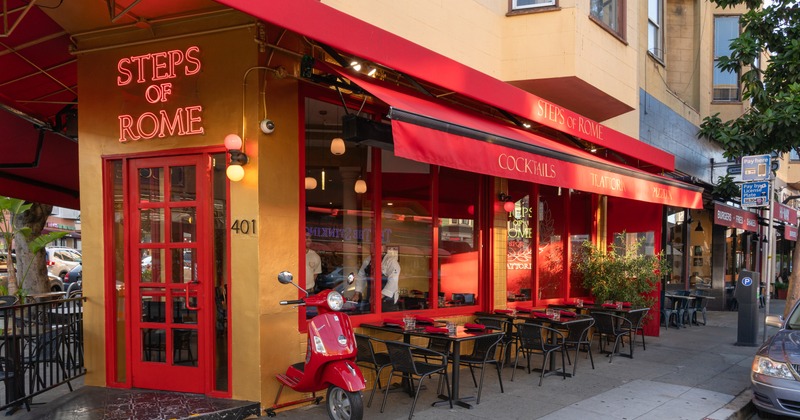 Outdoor seating area by the restaurant entrance