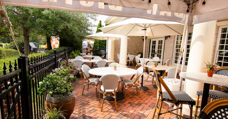 Outside, patio, tables and chairs, parasols