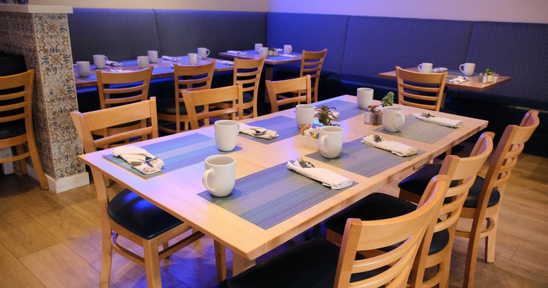 Interior, set table with tableware and chairs