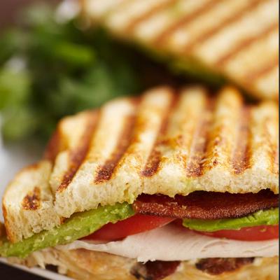 Californian sandwich, with turkey, avocado, bacon, tomato, Swiss, and mayo.