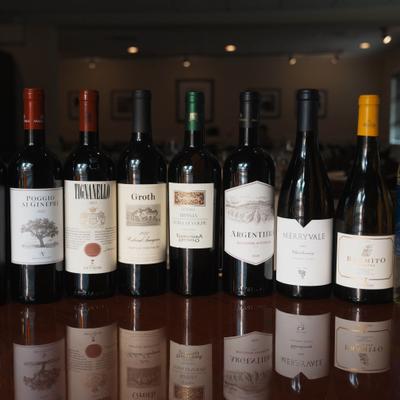 Assorted wine bottles.