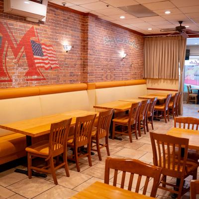 Diner area, booths, tables and chairs.