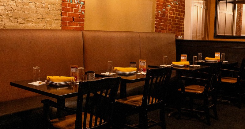 Interior, tables set for guests