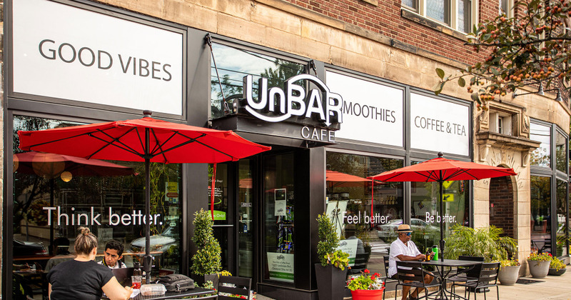Entrance door with a logo above it