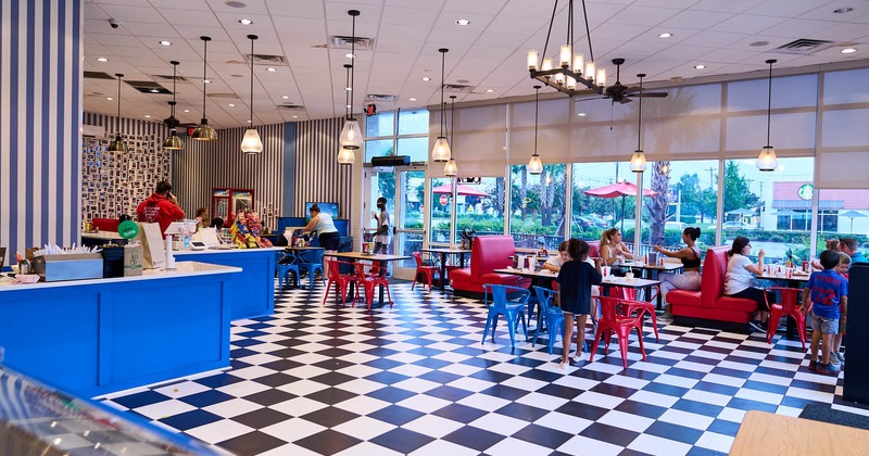 Interior, wide view, dining area, guests enjoying their food