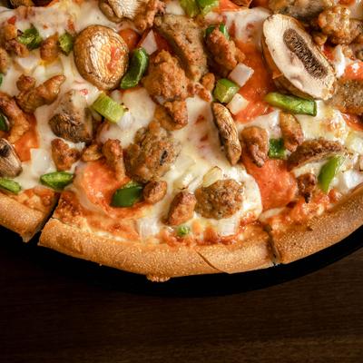 Portland House Special pizza, partial view.