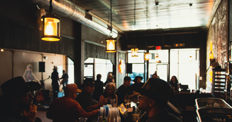 Interior, people and staff at the bar