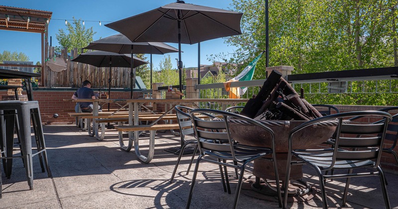 Outdoor area with chairs around the fire pit