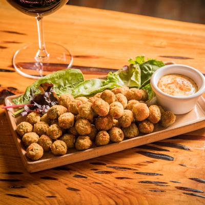 Fried olives and red wine