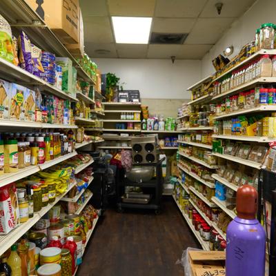 Aisle with stocked shelves.