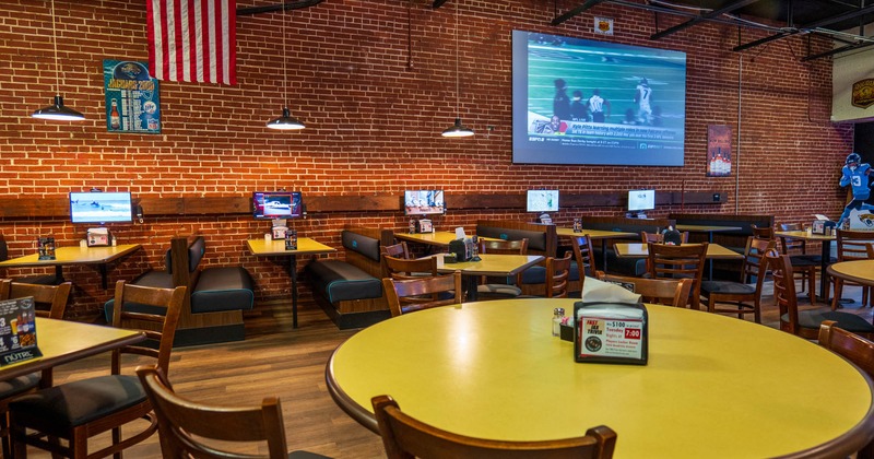 Dining area with tables and booths