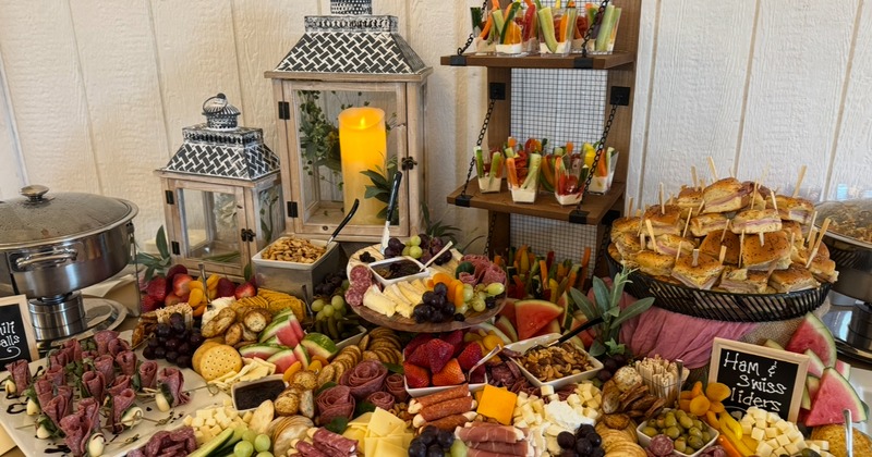 A large grazing table with a wide variety of foods