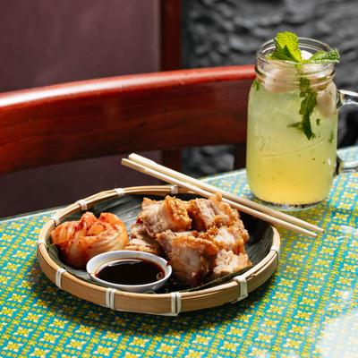 Crispy Pork Belly Bites and lychee-mint lemonade.