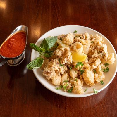 Fried calamari plate and dip.