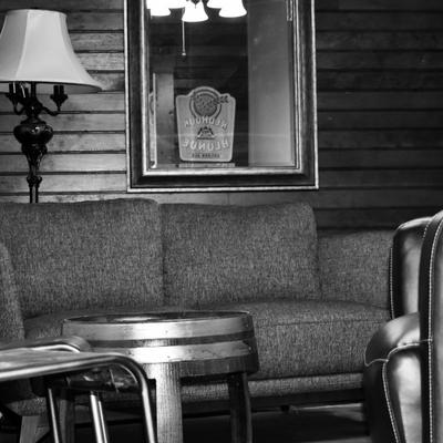 Sofa with window and lamp in the back