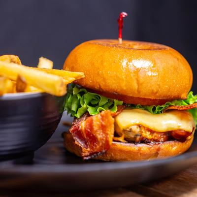 BBQ chicken club served with French fries.
