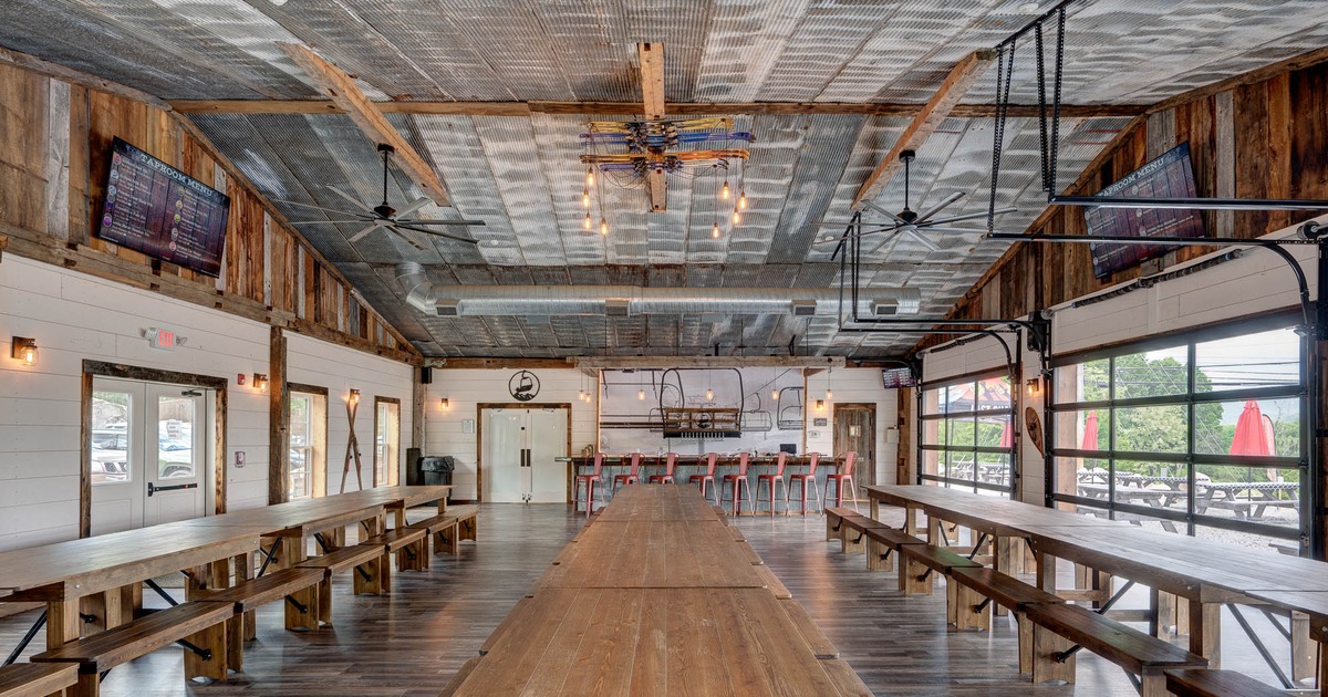 Interior, seating area with tables and benches