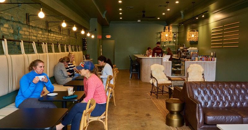 Interior, guests enjoying their drinks and chatting