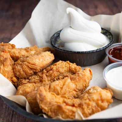 Fried chicken and Peach Cobbler with conidiments