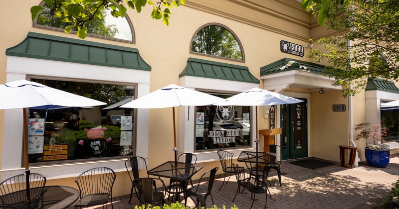 Exterior seating area with sun umbrellas