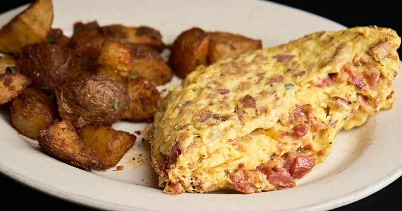 Bacon omelet with house fries