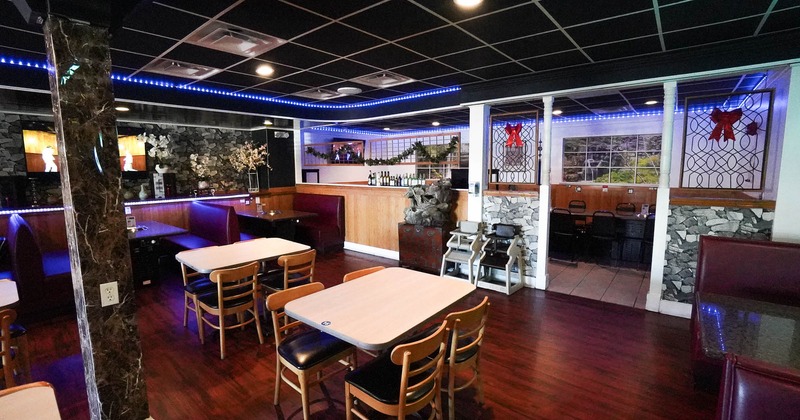 Interior,  dining area with tables and chairs