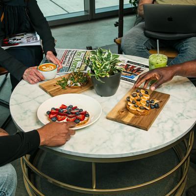 Fruit toasts avocado toast, and coffee.