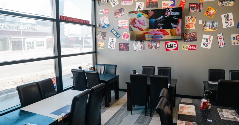Interior seating area with tables and chairs