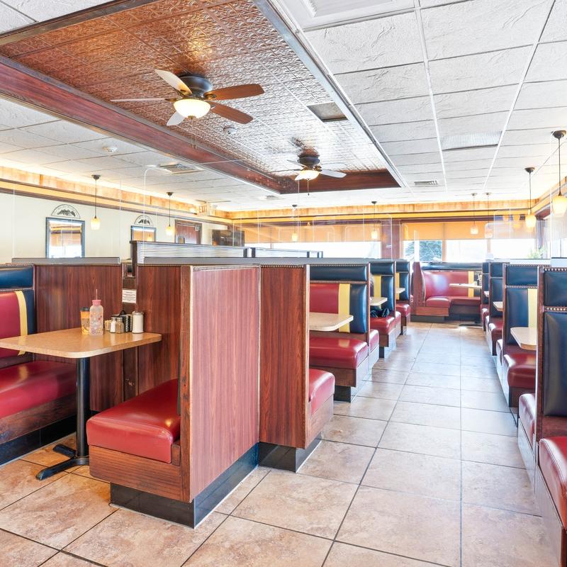 Interior, dining booths ready for guests