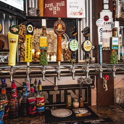 Beer taps with branded handles.