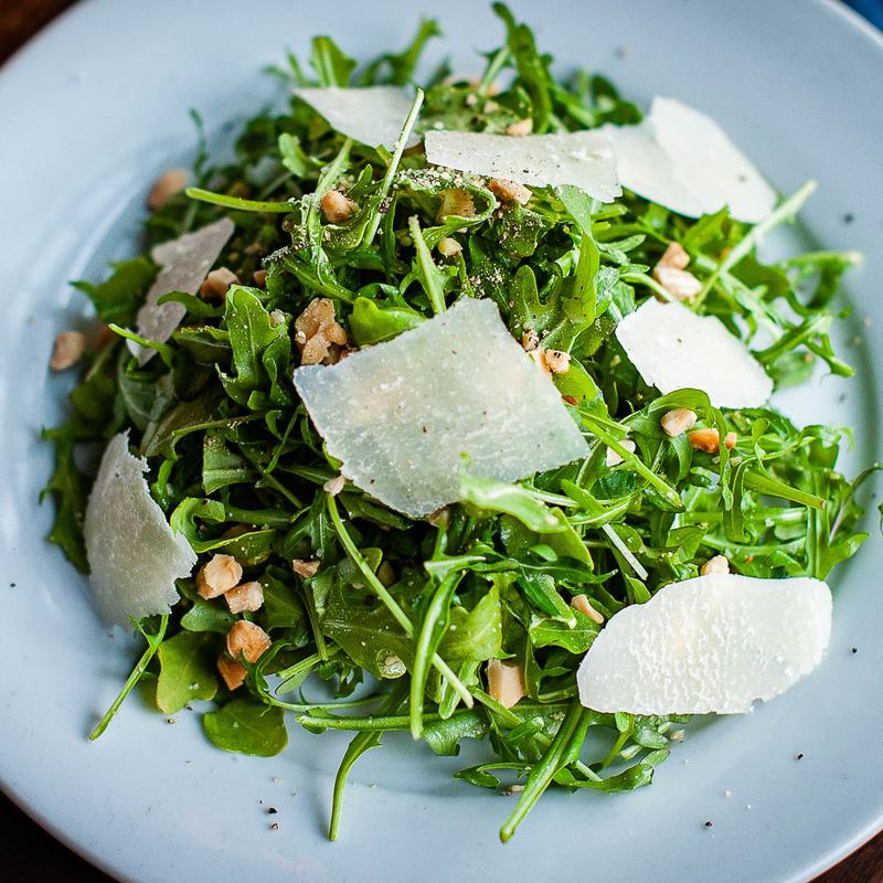 Organic wild arugula, toasted marcona almonds, reggiano, olive oil, fresh lemon juice - GF photo