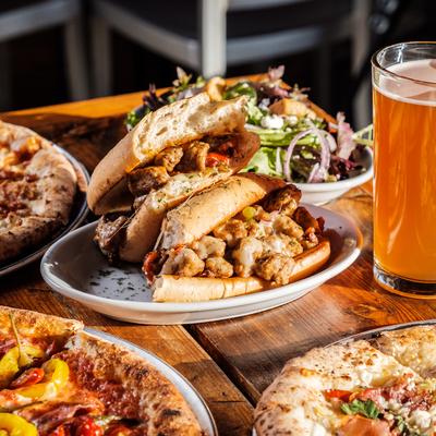 Assorted dishes and beer.