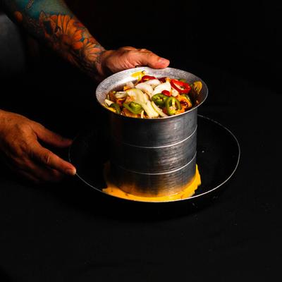 Employee carrying a dish.