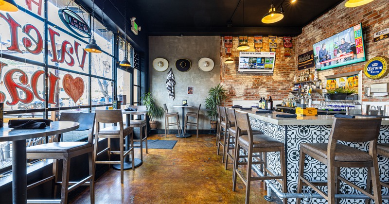 Interior, bar area across the windowpane