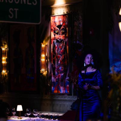 Singer standing at the stage while live performance.