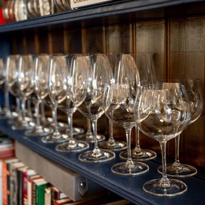 Wine glasses, lined up.