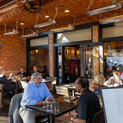 Customers sitting outside.