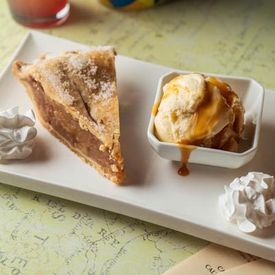 Apple pie served with ice cream.