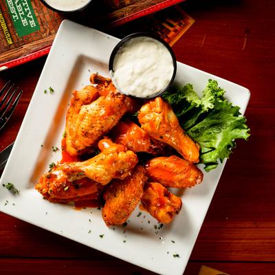 Buffalo chicken wings, with ranch dressing.