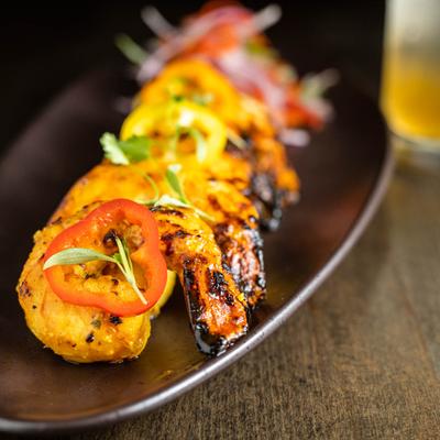 Lemon and herbs marinated grilled prawns