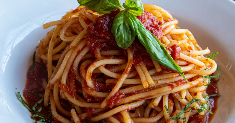 Spaghetti with tomato sauce and meat closeup