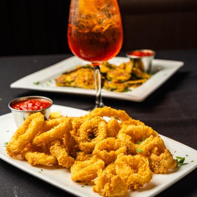 Fried calamari paired with an Aperol Spritz.